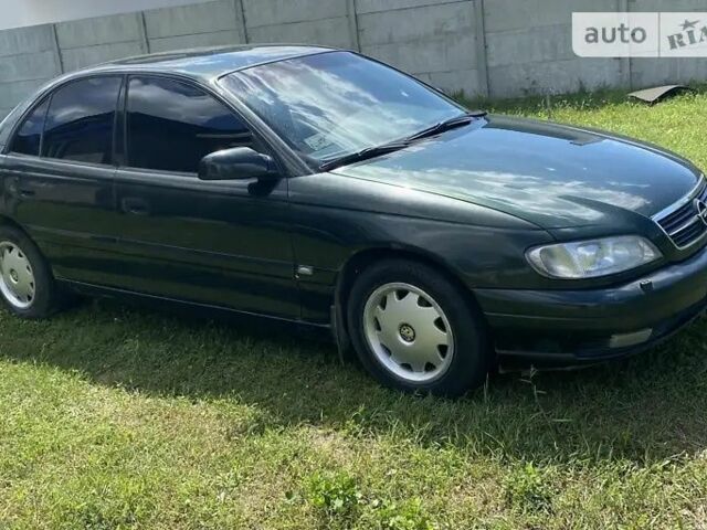 Зелений Опель Омега, об'ємом двигуна 2.2 л та пробігом 200 тис. км за 1600 $, фото 5 на Automoto.ua