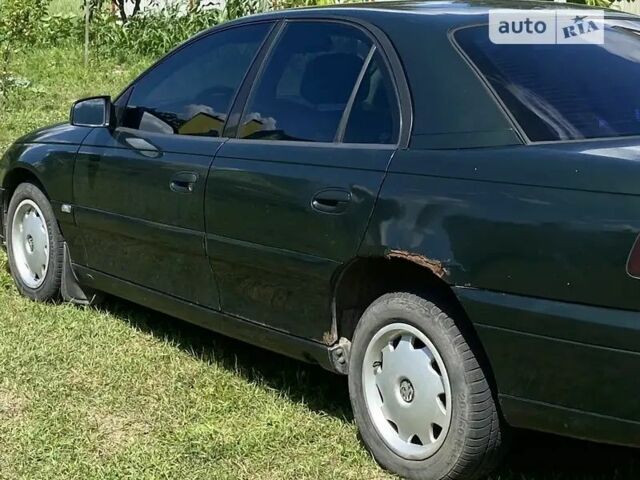 Зелений Опель Омега, об'ємом двигуна 2.2 л та пробігом 200 тис. км за 1600 $, фото 3 на Automoto.ua
