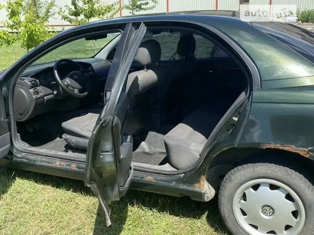 Зелений Опель Омега, об'ємом двигуна 2.2 л та пробігом 200 тис. км за 1600 $, фото 1 на Automoto.ua