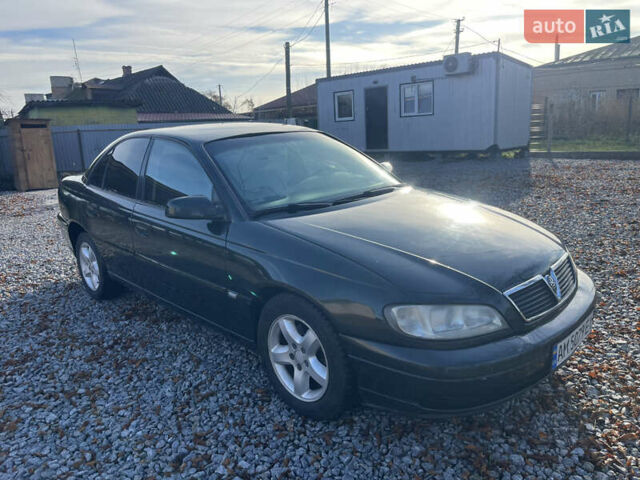 Зеленый Опель Омега, объемом двигателя 2.2 л и пробегом 350 тыс. км за 2500 $, фото 4 на Automoto.ua