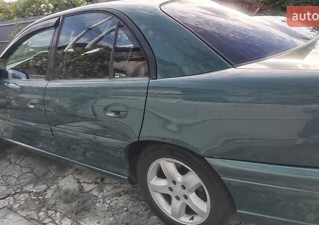 Зелений Опель Омега, об'ємом двигуна 2.2 л та пробігом 475 тис. км за 3700 $, фото 5 на Automoto.ua