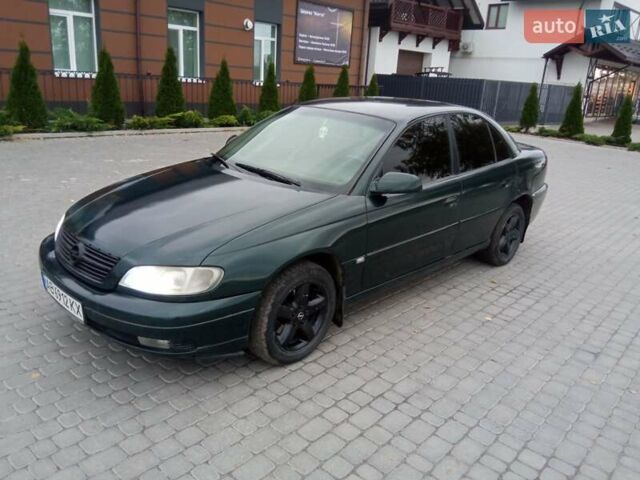 Зеленый Опель Омега, объемом двигателя 2.2 л и пробегом 324 тыс. км за 2500 $, фото 7 на Automoto.ua