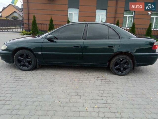 Зеленый Опель Омега, объемом двигателя 2.2 л и пробегом 324 тыс. км за 2500 $, фото 5 на Automoto.ua