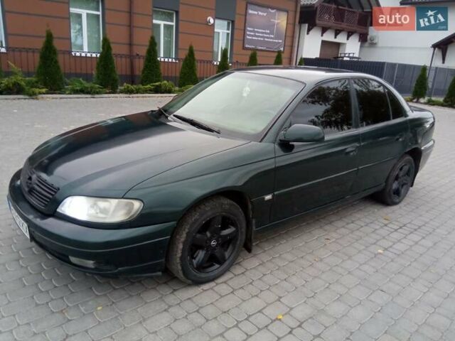 Зеленый Опель Омега, объемом двигателя 2.2 л и пробегом 324 тыс. км за 2500 $, фото 18 на Automoto.ua