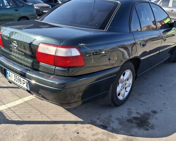 Зеленый Опель Омега, объемом двигателя 2.2 л и пробегом 280 тыс. км за 2600 $, фото 4 на Automoto.ua