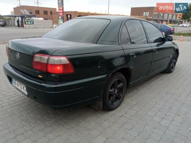 Зеленый Опель Омега, объемом двигателя 2.2 л и пробегом 324 тыс. км за 2500 $, фото 15 на Automoto.ua