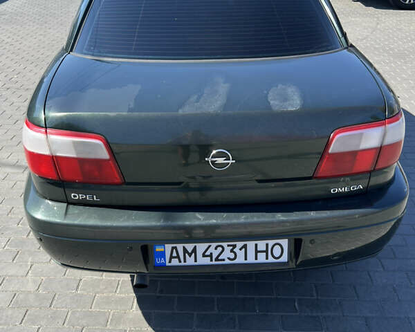 Зелений Опель Омега, об'ємом двигуна 2.2 л та пробігом 318 тис. км за 2500 $, фото 4 на Automoto.ua