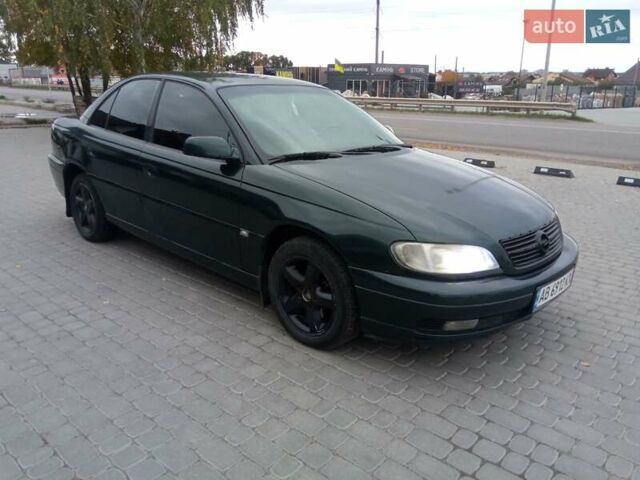 Зеленый Опель Омега, объемом двигателя 2.2 л и пробегом 324 тыс. км за 2500 $, фото 9 на Automoto.ua