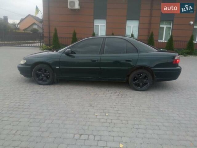 Зеленый Опель Омега, объемом двигателя 2.2 л и пробегом 324 тыс. км за 2500 $, фото 1 на Automoto.ua