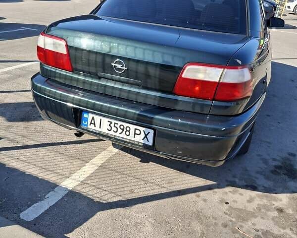 Зеленый Опель Омега, объемом двигателя 2.2 л и пробегом 280 тыс. км за 2600 $, фото 3 на Automoto.ua