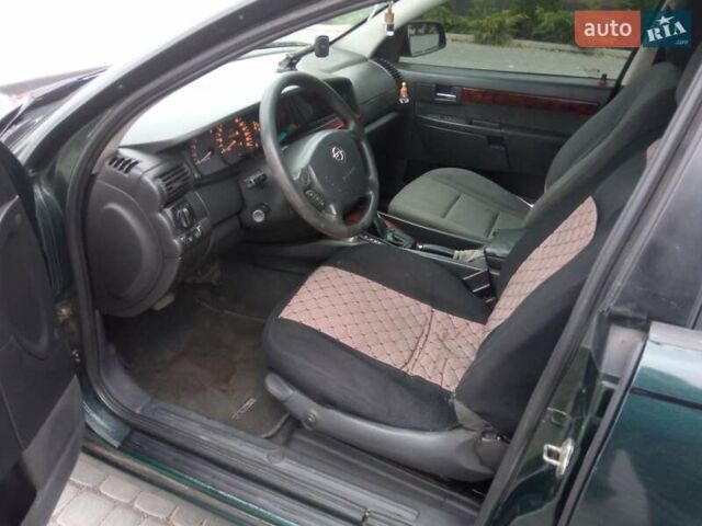 Зеленый Опель Омега, объемом двигателя 2.2 л и пробегом 324 тыс. км за 2500 $, фото 12 на Automoto.ua