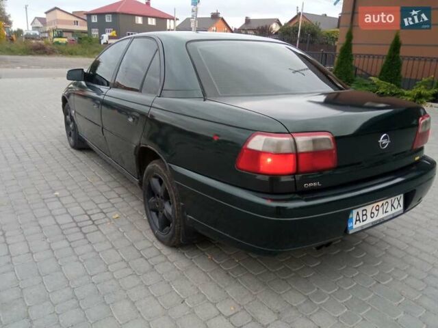 Зеленый Опель Омега, объемом двигателя 2.2 л и пробегом 324 тыс. км за 2500 $, фото 17 на Automoto.ua
