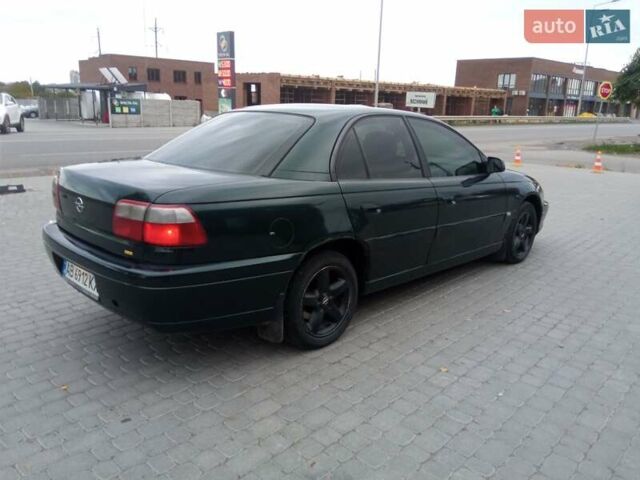 Зеленый Опель Омега, объемом двигателя 2.2 л и пробегом 324 тыс. км за 2500 $, фото 2 на Automoto.ua