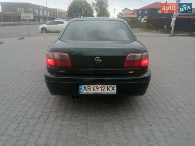 Зеленый Опель Омега, объемом двигателя 2.2 л и пробегом 324 тыс. км за 2500 $, фото 3 на Automoto.ua