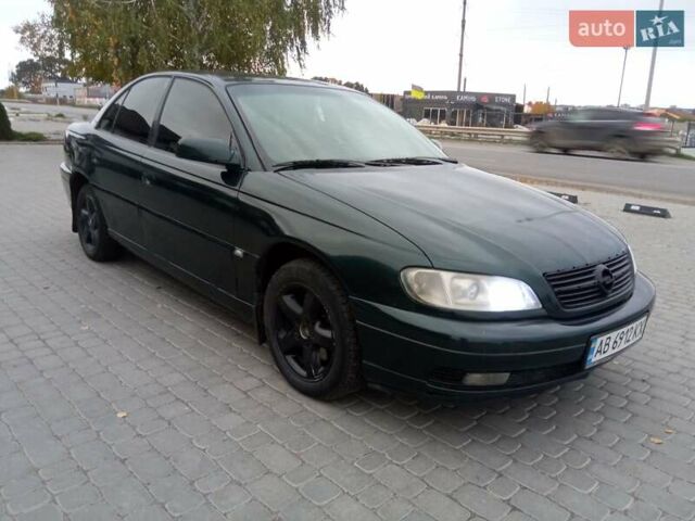 Зеленый Опель Омега, объемом двигателя 2.2 л и пробегом 324 тыс. км за 2500 $, фото 16 на Automoto.ua