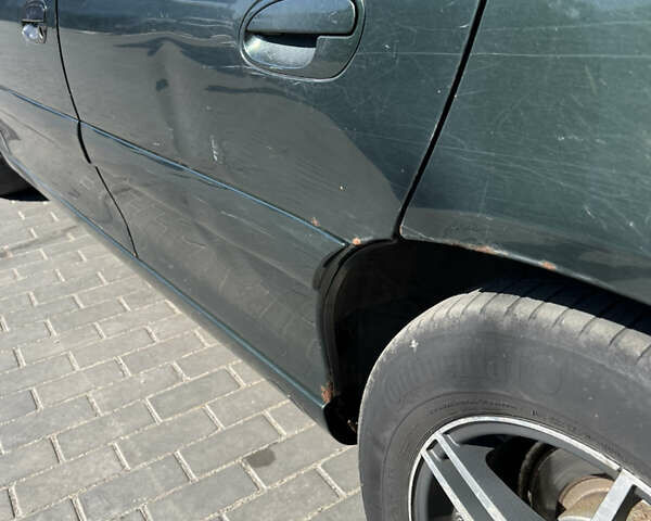 Зелений Опель Омега, об'ємом двигуна 2.2 л та пробігом 318 тис. км за 2500 $, фото 7 на Automoto.ua