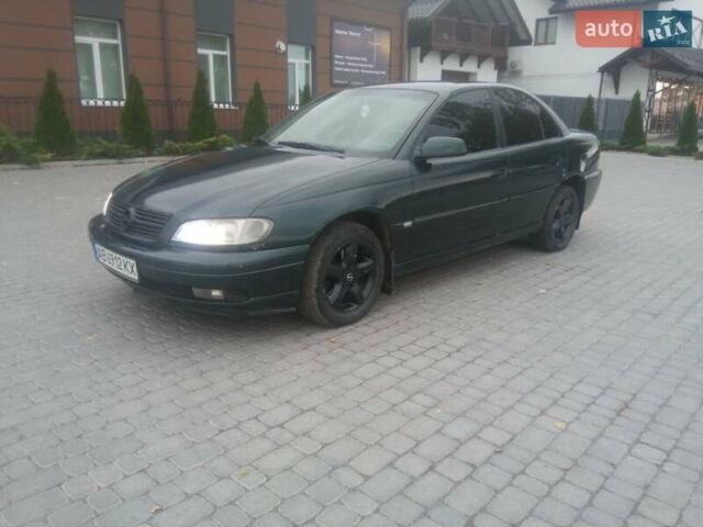 Зеленый Опель Омега, объемом двигателя 2.2 л и пробегом 324 тыс. км за 2500 $, фото 4 на Automoto.ua