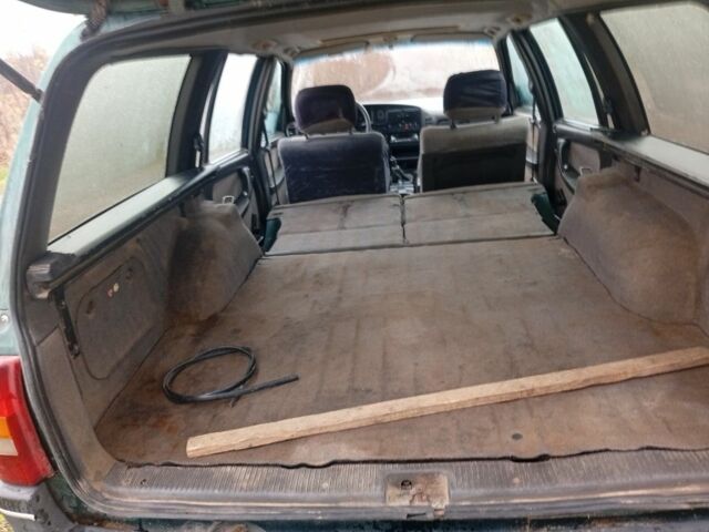 Зеленый Опель Омега, объемом двигателя 2 л и пробегом 65 тыс. км за 899 $, фото 7 на Automoto.ua