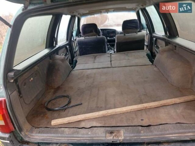 Зелений Опель Омега, об'ємом двигуна 2 л та пробігом 65 тис. км за 899 $, фото 10 на Automoto.ua