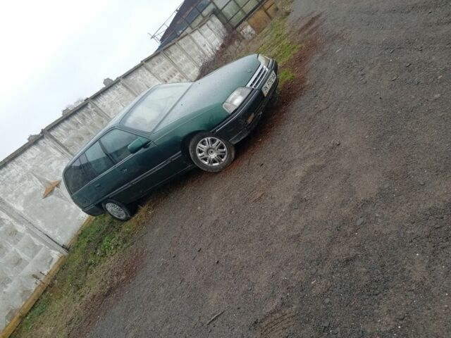 Зеленый Опель Омега, объемом двигателя 2 л и пробегом 65 тыс. км за 899 $, фото 2 на Automoto.ua