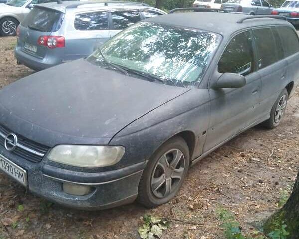 Зеленый Опель Омега, объемом двигателя 2 л и пробегом 385 тыс. км за 1324 $, фото 1 на Automoto.ua