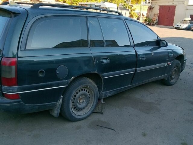 Зелений Опель Омега, об'ємом двигуна 2 л та пробігом 2 тис. км за 700 $, фото 4 на Automoto.ua