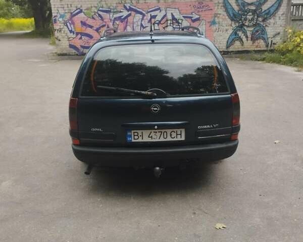 Зелений Опель Омега, об'ємом двигуна 2.5 л та пробігом 347 тис. км за 2100 $, фото 1 на Automoto.ua