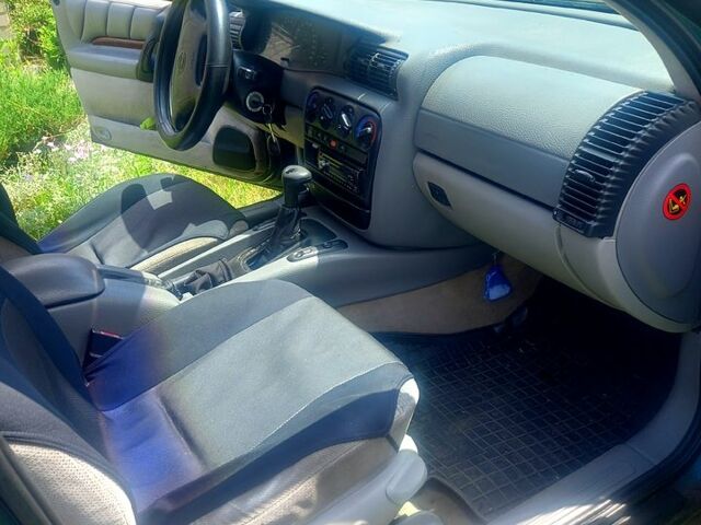 Зелений Опель Омега, об'ємом двигуна 2 л та пробігом 363 тис. км за 1800 $, фото 5 на Automoto.ua
