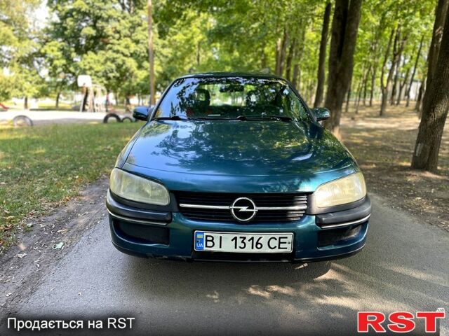 Зеленый Опель Омега, объемом двигателя 2.5 л и пробегом 263 тыс. км за 1400 $, фото 1 на Automoto.ua