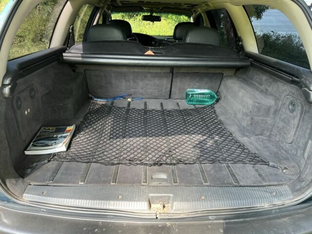 Зеленый Опель Омега, объемом двигателя 2.5 л и пробегом 290 тыс. км за 3200 $, фото 11 на Automoto.ua