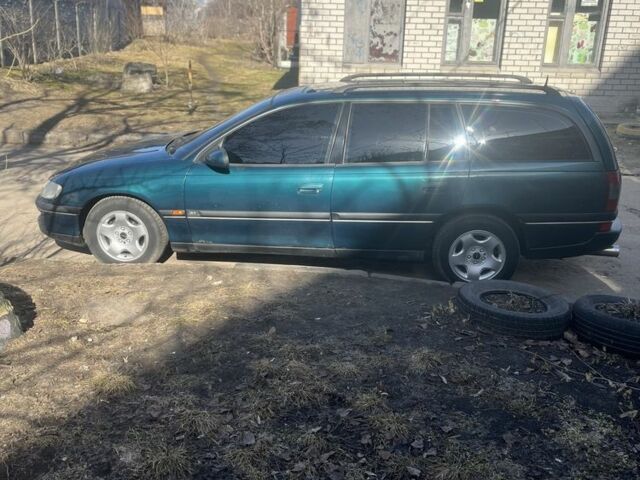 Зеленый Опель Омега, объемом двигателя 2.5 л и пробегом 265 тыс. км за 3000 $, фото 5 на Automoto.ua