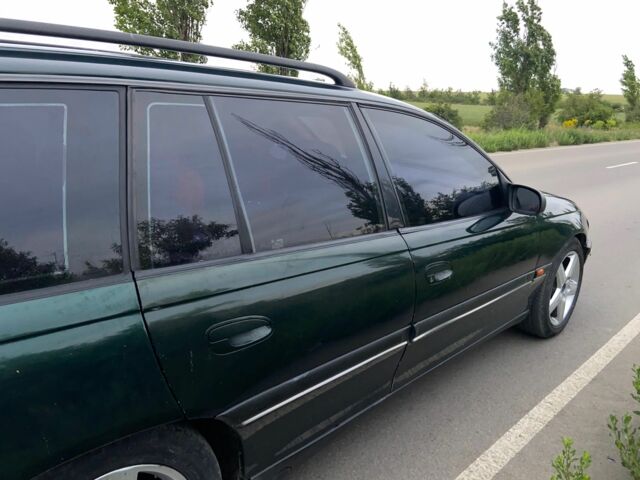 Зелений Опель Омега, об'ємом двигуна 2 л та пробігом 380 тис. км за 2214 $, фото 6 на Automoto.ua