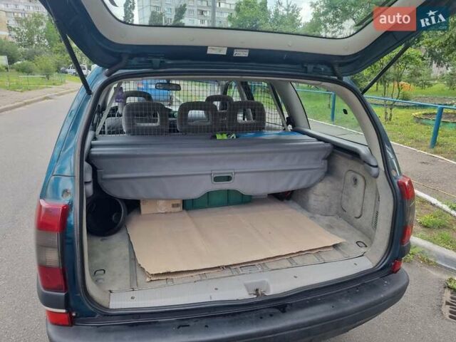 Зеленый Опель Омега, объемом двигателя 2 л и пробегом 294 тыс. км за 2100 $, фото 4 на Automoto.ua