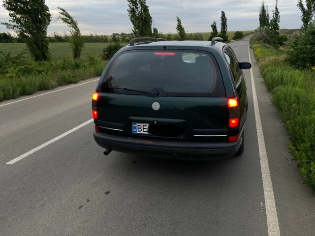 Зелений Опель Омега, об'ємом двигуна 2 л та пробігом 380 тис. км за 2214 $, фото 4 на Automoto.ua