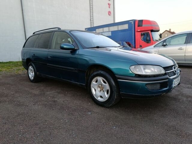 Зеленый Опель Омега, объемом двигателя 2 л и пробегом 327 тыс. км за 1050 $, фото 10 на Automoto.ua