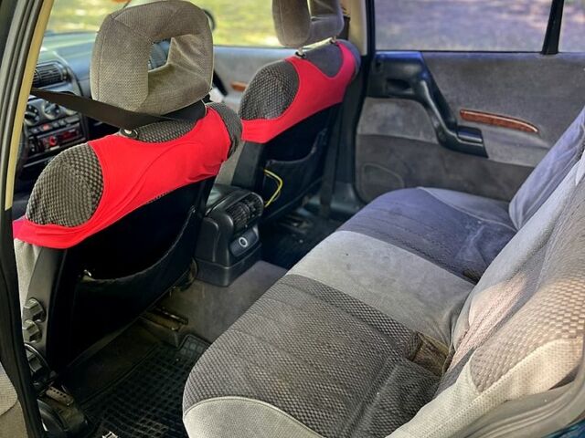 Зеленый Опель Омега, объемом двигателя 2.5 л и пробегом 263 тыс. км за 1400 $, фото 7 на Automoto.ua