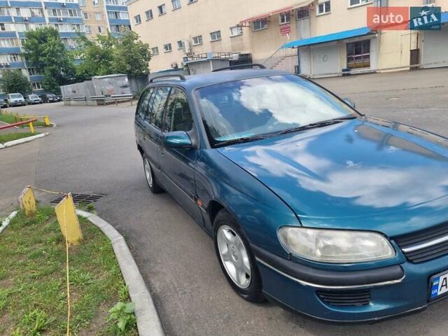 Зеленый Опель Омега, объемом двигателя 2 л и пробегом 294 тыс. км за 2100 $, фото 9 на Automoto.ua