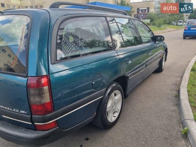 Зеленый Опель Омега, объемом двигателя 2 л и пробегом 294 тыс. км за 2100 $, фото 5 на Automoto.ua