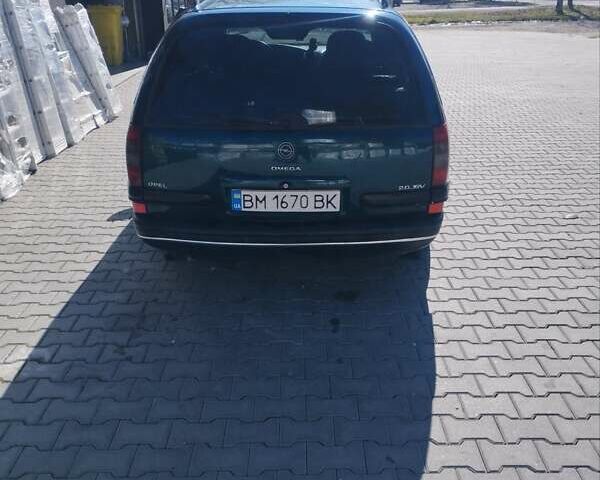 Зеленый Опель Омега, объемом двигателя 2 л и пробегом 480 тыс. км за 2600 $, фото 6 на Automoto.ua