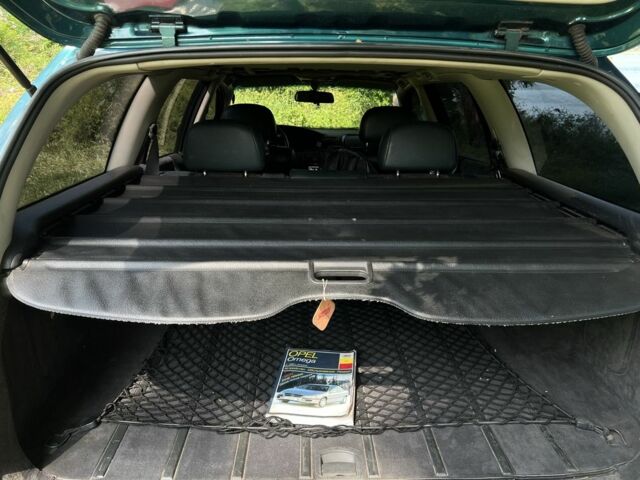 Зеленый Опель Омега, объемом двигателя 2.5 л и пробегом 290 тыс. км за 3200 $, фото 10 на Automoto.ua