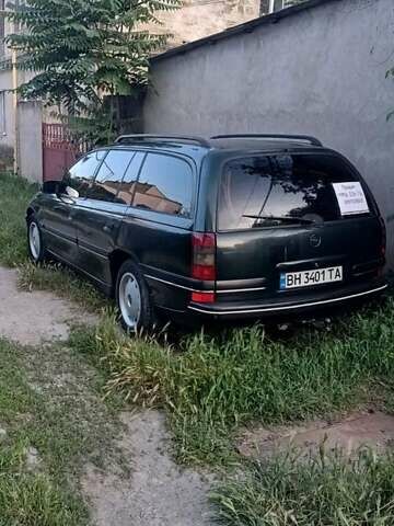 Зелений Опель Омега, об'ємом двигуна 2 л та пробігом 500 тис. км за 2900 $, фото 3 на Automoto.ua