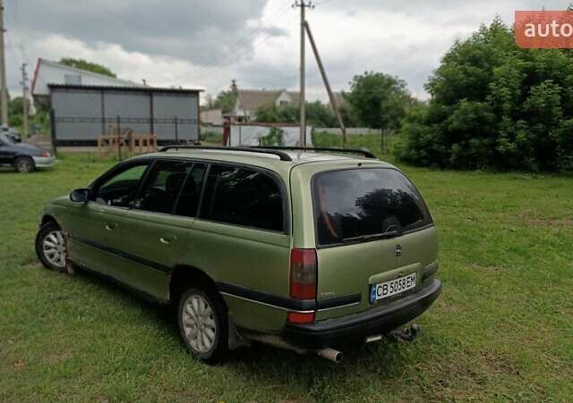 Зеленый Опель Омега, объемом двигателя 2 л и пробегом 267 тыс. км за 1599 $, фото 7 на Automoto.ua