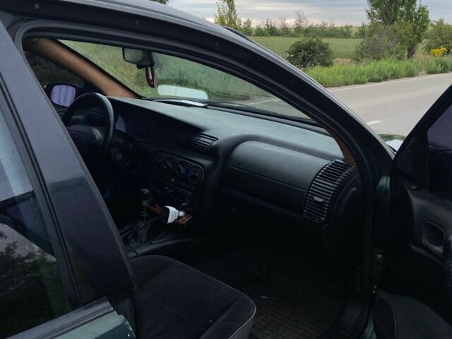 Зелений Опель Омега, об'ємом двигуна 2 л та пробігом 380 тис. км за 2214 $, фото 1 на Automoto.ua