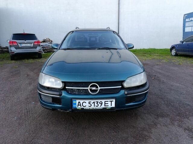 Зеленый Опель Омега, объемом двигателя 2 л и пробегом 327 тыс. км за 1050 $, фото 2 на Automoto.ua