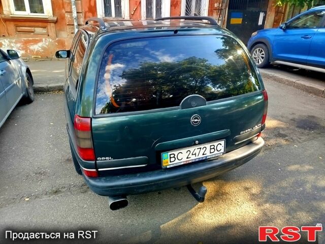 Зеленый Опель Омега, объемом двигателя 2.5 л и пробегом 381 тыс. км за 2000 $, фото 3 на Automoto.ua