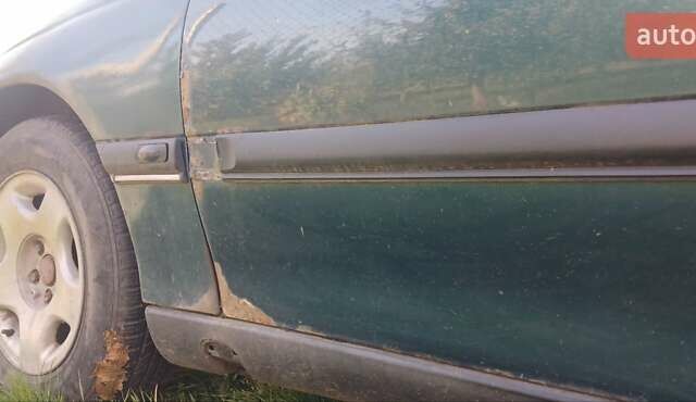 Зелений Опель Омега, об'ємом двигуна 2 л та пробігом 350 тис. км за 750 $, фото 4 на Automoto.ua