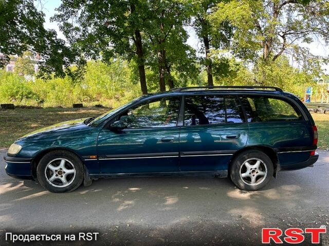 Зеленый Опель Омега, объемом двигателя 2.5 л и пробегом 263 тыс. км за 1400 $, фото 5 на Automoto.ua