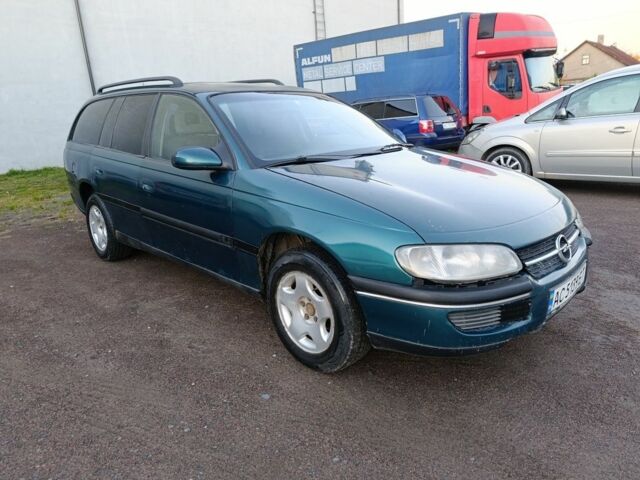 Зеленый Опель Омега, объемом двигателя 2 л и пробегом 327 тыс. км за 1050 $, фото 1 на Automoto.ua