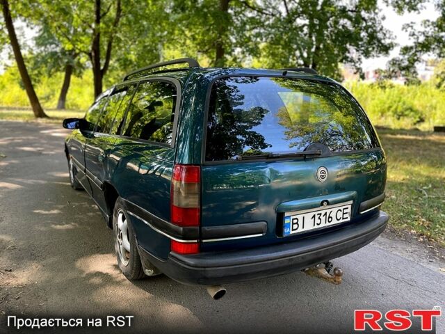 Зеленый Опель Омега, объемом двигателя 2.5 л и пробегом 263 тыс. км за 1400 $, фото 4 на Automoto.ua