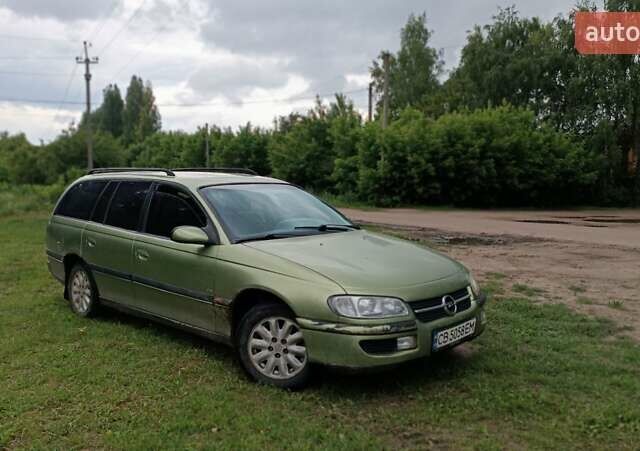 Зеленый Опель Омега, объемом двигателя 2 л и пробегом 267 тыс. км за 1599 $, фото 8 на Automoto.ua